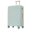 A light blue suitcase with beige accents is shown against a white background. Náhľad obrázku produktu