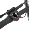 A close-up view of an electric bicycle's handlebar display and brake lever. Produktbild-Vorschau