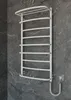 A white electric towel warmer mounted on a dark gray, marbled tiled wall. Náhľad obrázku produktu