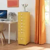 A yellow roll container with 8 drawers is placed next to a white desk with a computer and a lamp. Anteprima dell’immagine prodotto