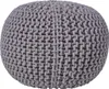 A close-up studio shot of a round, knitted pouf. Náhled obrázku produktu