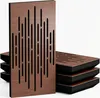 A stack of acoustic panels with a single panel standing in front. Podgląd zdjęcia produktu