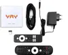 A collection of items for a streaming box, including remotes, a power adapter, a USB cable, a manual, and a USB dongle. Produktbild-Vorschau