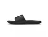 A black Nike Kawa slide sandal is shown from the side against a white background. Podgląd zdjęcia produktu