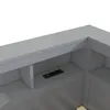 A close-up view of a gray bed frame with built-in shelves and a power outlet with USB ports. Produktbild-Vorschau
