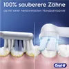 Comparison of a manual toothbrush and an electric toothbrush head cleaning teeth. Produktbild-Vorschau