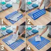 A collage of four images showing a person demonstrating how to use a blue clothing folding board on a wooden table. Náhled obrázku produktu