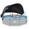 Two children are playing in a round swimming pool with a black sunshade. Náhled obrázku produktu