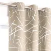 A close-up view of beige curtains with a white abstract pattern, hanging from a curtain rod. Produktbild-Vorschau