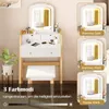 A vanity table with a mirror and stool, shown with different lighting options. Produktbild-Vorschau