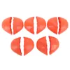 A top-down view of several orange shoe toe inserts arranged in two rows on a white background. Produktbild-Vorschau
