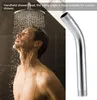 A man is showering under a shower head, with a close-up of a shower arm extension on the right side of the image. Produktbild-Vorschau