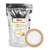 A silver pouch of citric acid next to a wooden bowl filled with the product. Produktbild-Vorschau