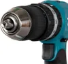 Close-up of the chuck and part of the body of a teal cordless drill. Produktbild-Vorschau
