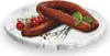 Sausages on a marble plate with cherry tomatoes and mint. Podgląd zdjęcia produktu