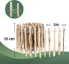 A rolled-up wooden fence with dimensions indicated. Produktbild-Vorschau