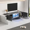 A modern TV stand with open compartments, one featuring blue LED lighting, is shown against a white wall with a TV mounted above it. Decorative items and books are placed on and inside the stand. Anteprima dell’immagine prodotto