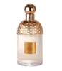 A clear, professional studio shot of a Guerlain Aqua Allegoria Mandarine Basilic perfume bottle against a plain white background. Voir les images du produit