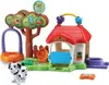 A Vtech Tut Tut Animo toy playset featuring a house, tree, swing, and dog figurine. Produktbild-Vorschau