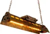 A hanging industrial-style lamp with exposed bulbs. Produktbild-Vorschau