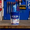 A bucket of hand cleaning towels is placed on a wooden workbench in front of a blue tool board. Náhled obrázku produktu
