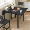 A dining table set up in a room with food and flowers. Produktbild-Vorschau