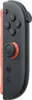 A close-up, side view of a Nintendo Joy-Con controller. Produktbild-Vorschau