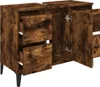 A wooden cabinet with two drawers and two doors, shown from a slightly elevated side angle. Podgląd zdjęcia produktu