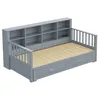 A grey daybed with a slatted mattress base, two drawers underneath, and a bookshelf headboard. Náhled obrázku produktu