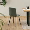 A gray dining chair is shown from the back, next to a wooden table with a French press and a cup of coffee. Produktbild-Vorschau