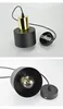 Two images of a black and gold pendant light fixture against a white background. Produktbild-Vorschau