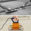 The top image shows two people using trowels to smooth wet concrete. The bottom image shows a hand holding an orange electric concrete vibrator. Podgląd zdjęcia produktu