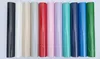 A collection of rolled-up sheets of colored adhesive foil, arranged vertically. Produktbild-Vorschau