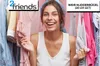 A smiling woman in front of a wardrobe filled with clothes. Produktbild-Vorschau