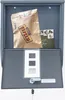 An open mailbox with mail inside. Produktbild-Vorschau