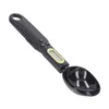 A black digital spoon scale on a white background. Náhľad obrázku produktu