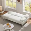 A white sofa bed is shown in a well-lit room with large windows. Produktbild-Vorschau