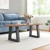 A living room scene with a blue sofa and a coffee table. Anteprima dell’immagine prodotto