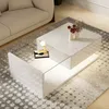 A modern living room scene with a white coffee table and a sofa. Voir les images du produit