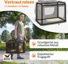 A man is walking outdoors carrying a dog carrier. The image also shows a diagram of the carrier's frame and text highlighting product features. Produktbild-Vorschau