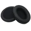 Two black ear pads for headphones are shown against a white background. Produktbild-Vorschau