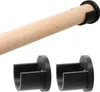 A wooden rod is held by a black bracket, with two other black brackets below. Produktbild-Vorschau