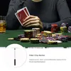 A person playing poker with a drink and chips on a green felt table. Produktbild-Vorschau