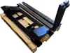 A forklift attachment with two forks is placed on a wooden pallet. The background is white. Produktbild-Vorschau