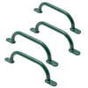 Four green climbing grips arranged diagonally on a white background. Náhľad obrázku produktu