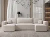 A modern U-shaped sofa in a living room setting. Produktbild-Vorschau