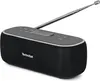 A black portable Bluetooth speaker with a silver antenna extended upwards, set against a white background. Produktbild-Vorschau