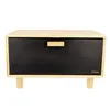 A bread box with a black front and wooden frame and legs. Náhled obrázku produktu