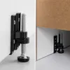 Close-up of adjustable feet for furniture, likely a kitchen cabinet or sink base unit. Produktbild-Vorschau