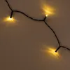 A string of solar-powered LED lights against a plain background. Produktbild-Vorschau